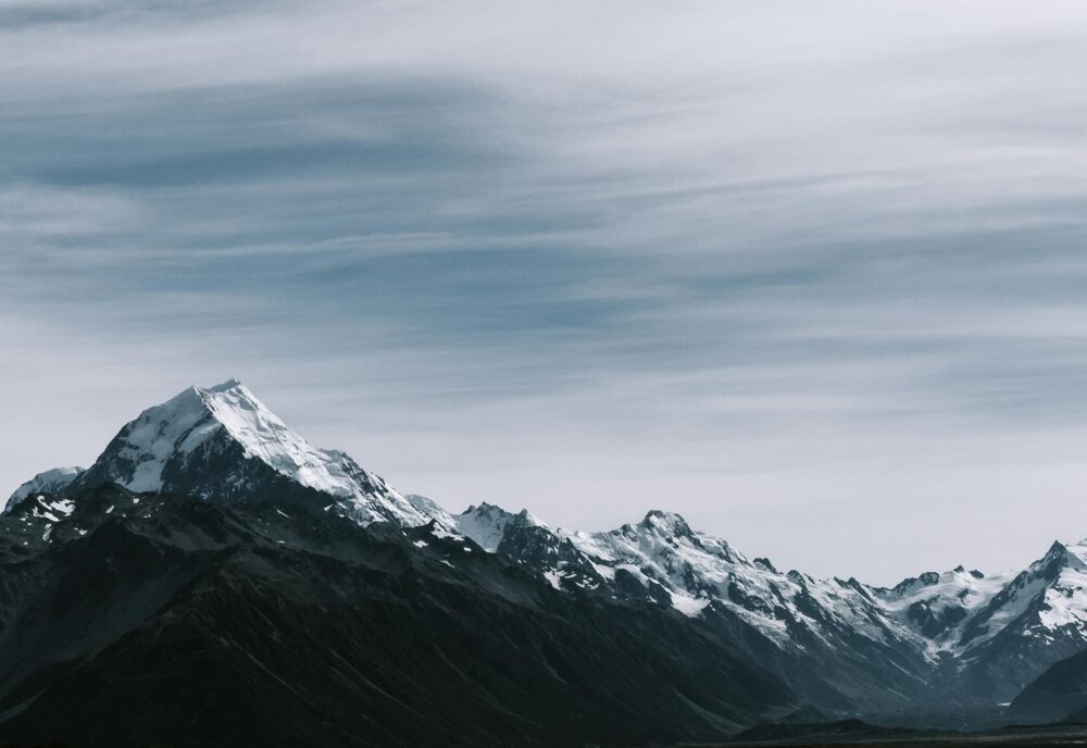 snow coated rocky mountains